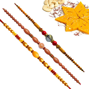 3 Rakhi - Crystals AD and Pearls Rakhis With Indian Sweets