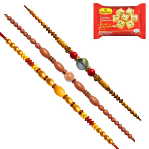 3 Rakhi - Crystals AD and Pearls Rakhis With Indian Sweets